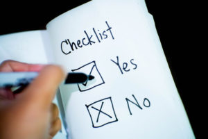Photo of checklist with yes and no boxes. Asheville septic system inspection.