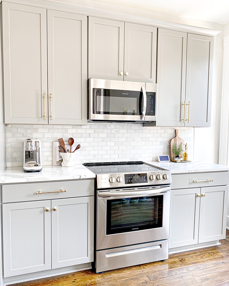 Beautiful modern white kitchen with light granite countertops.
Asheville home's market value.